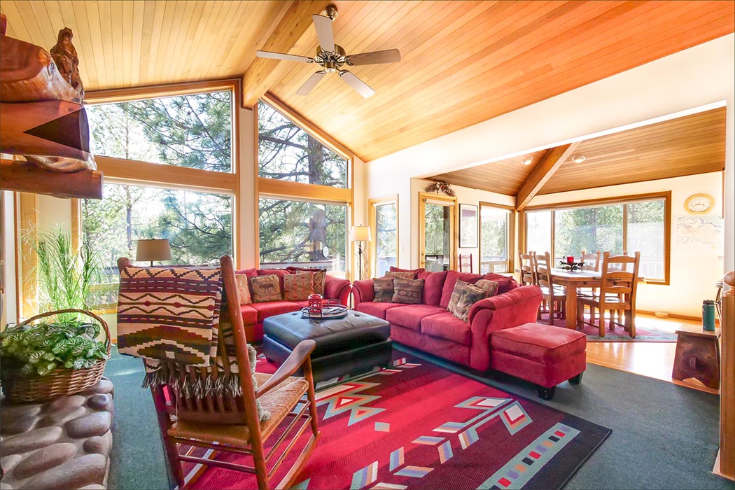 Warm great room, roaring fireplace family gathering together following a grand day out playing in the snow!