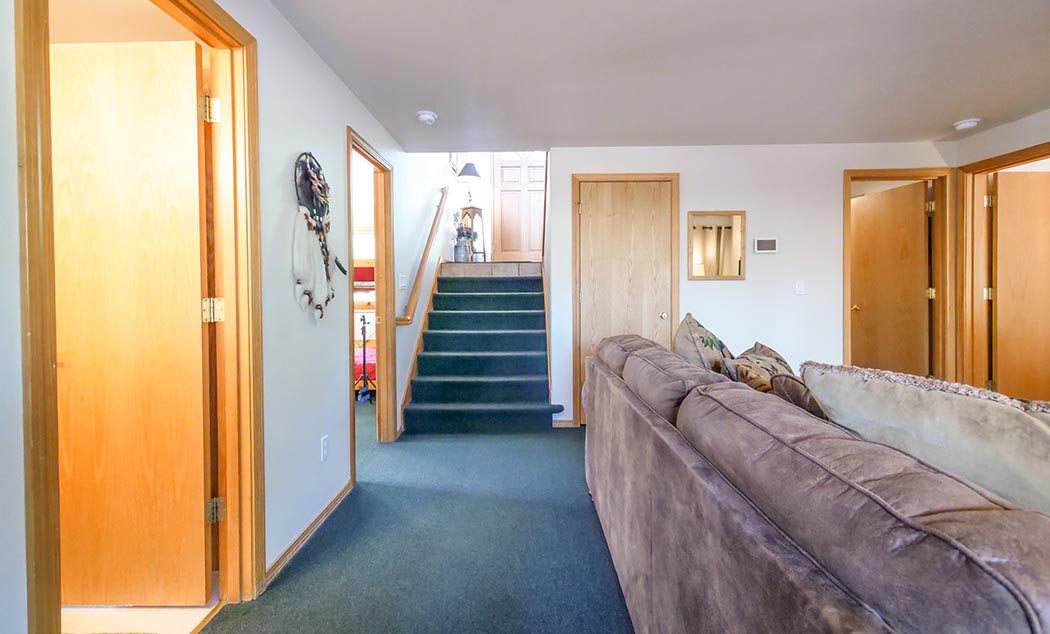 Sunriver master bedroom with king sized bed; ideal family ski home.