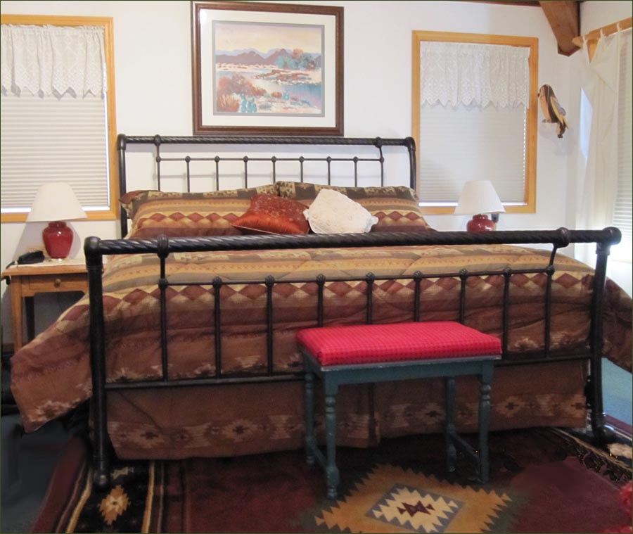Mt Bachelor master bedroom with king sized bed; ideal family ski home.