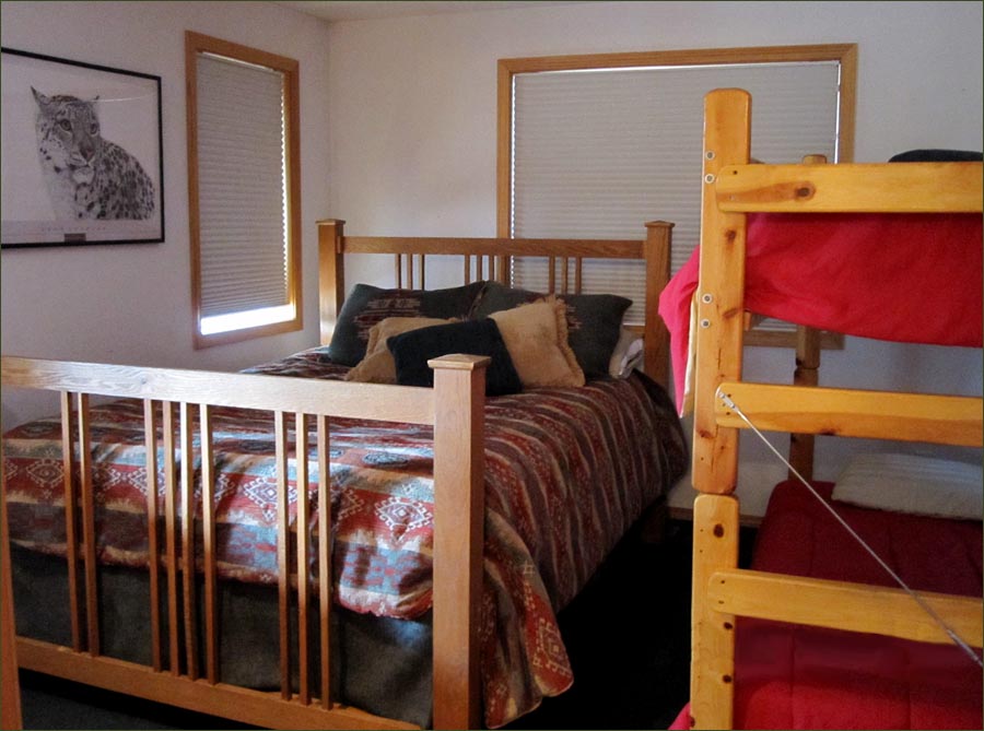 Mt Bachelor master bedroom with king sized bed; ideal family ski home.